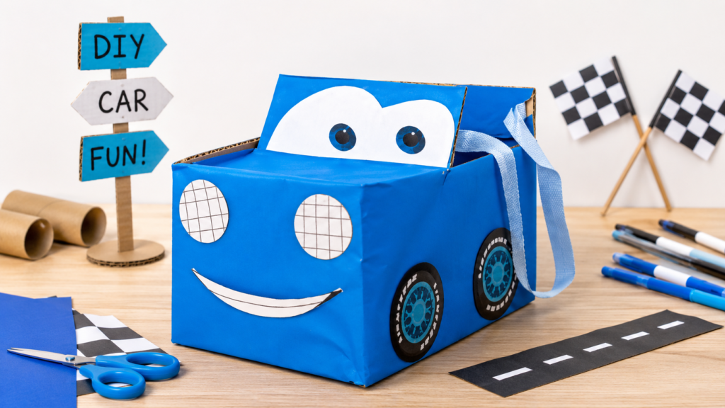 Carro de cartón reciclado para niños decorado con ruedas, ojos y colores.